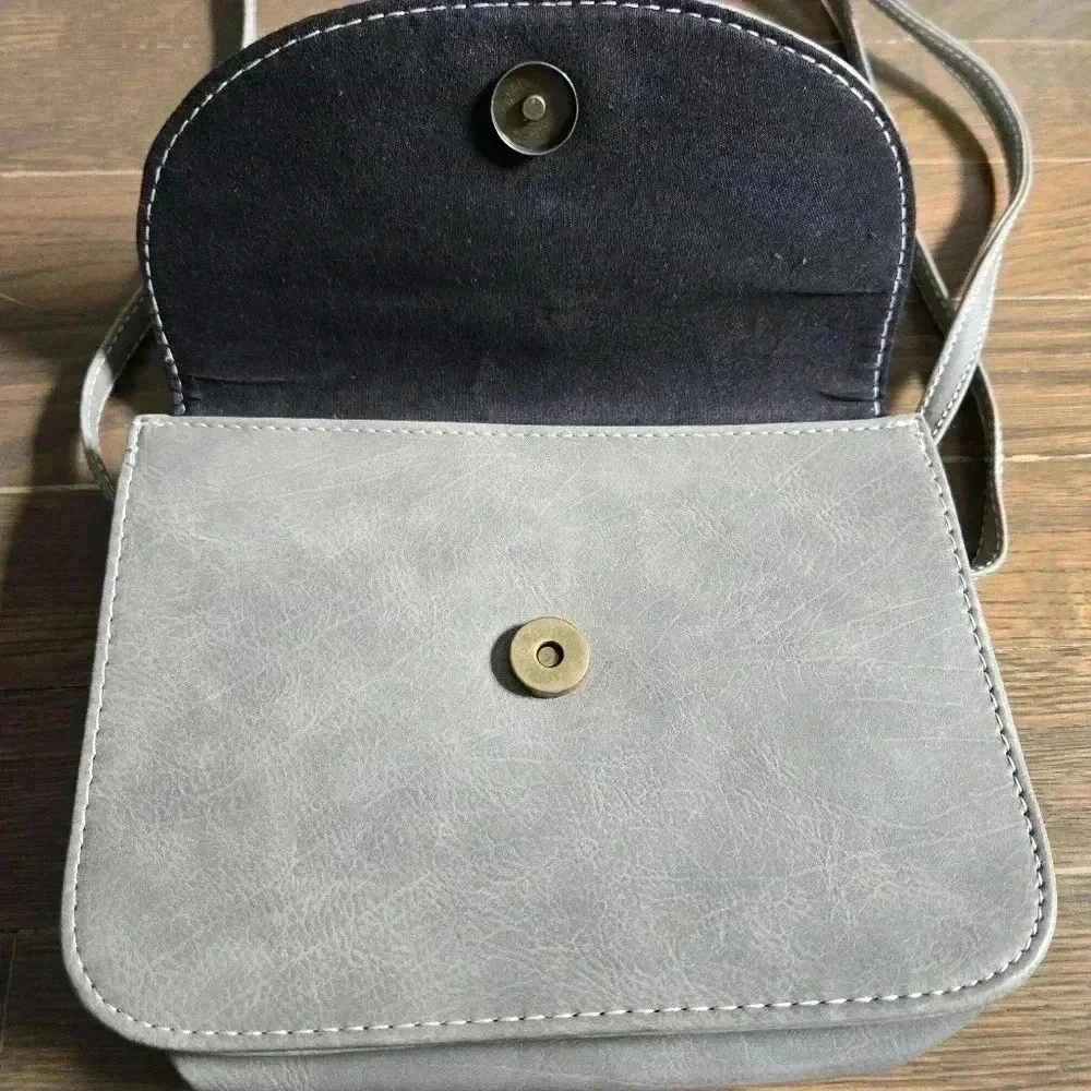 Grey crossbody boho festival bag with tassels from J francis